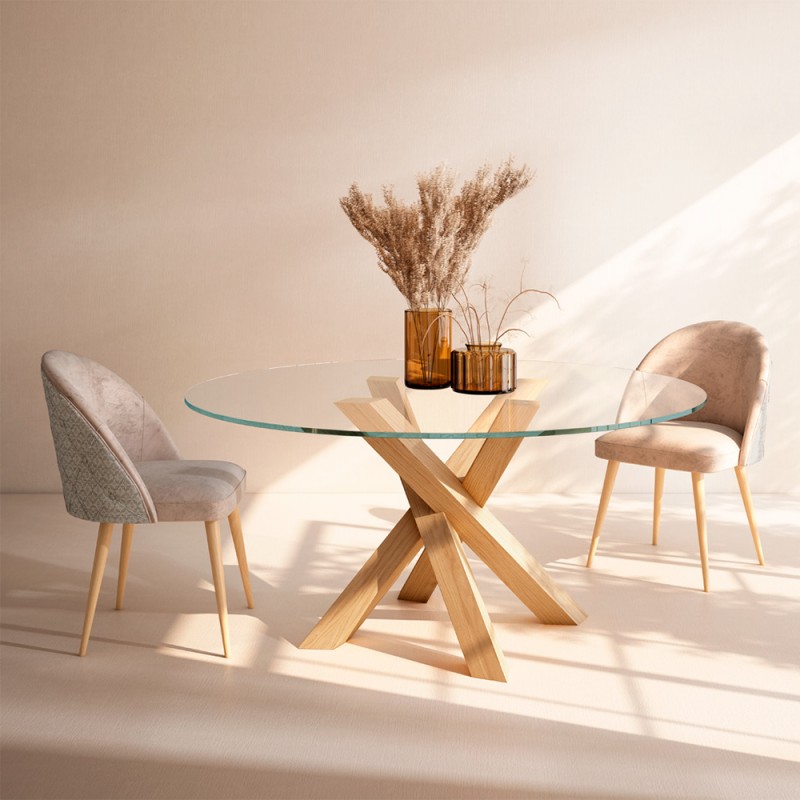 Mesa de comedor redonda de cristal con patas de madera