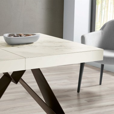 mesa comedor extensible porcelanico y pata metalica