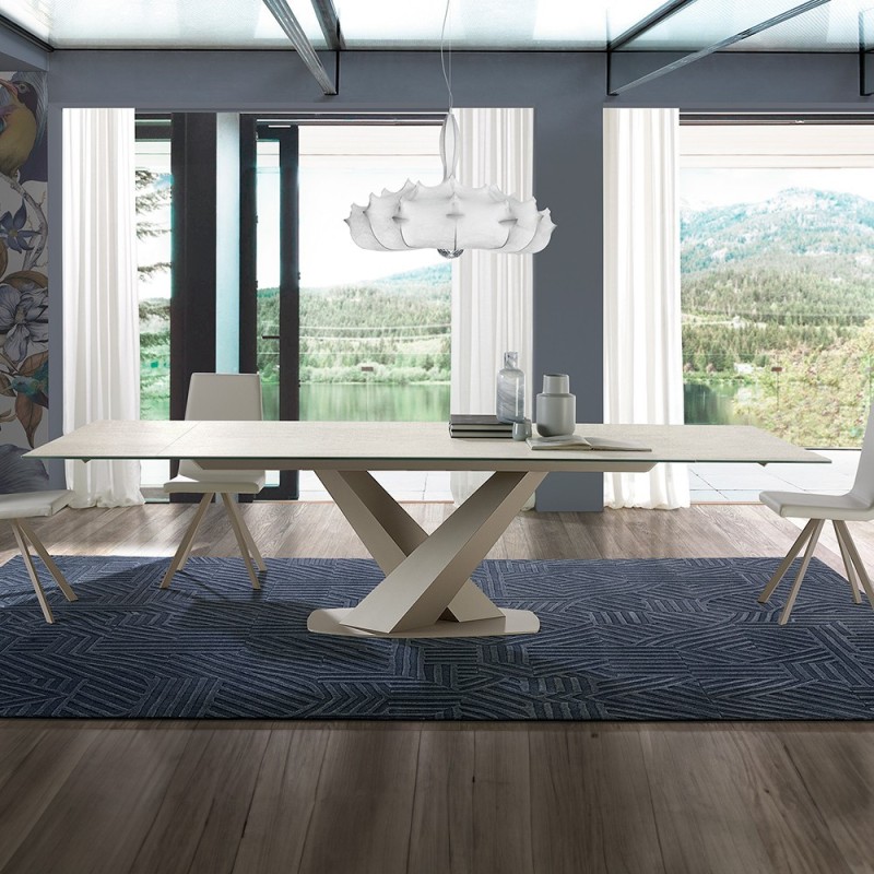 Mesa de comedor extensible de porcelanico y estructura metalica