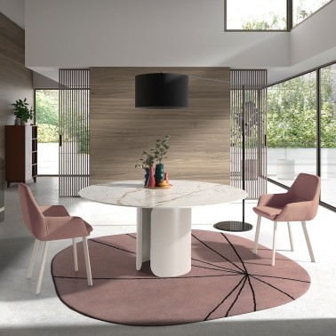 Mesa redonda en porcelanico con pata central metalica Loop